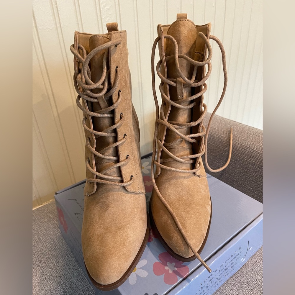 Tan short black heel boots. US size 8.5. Never worn